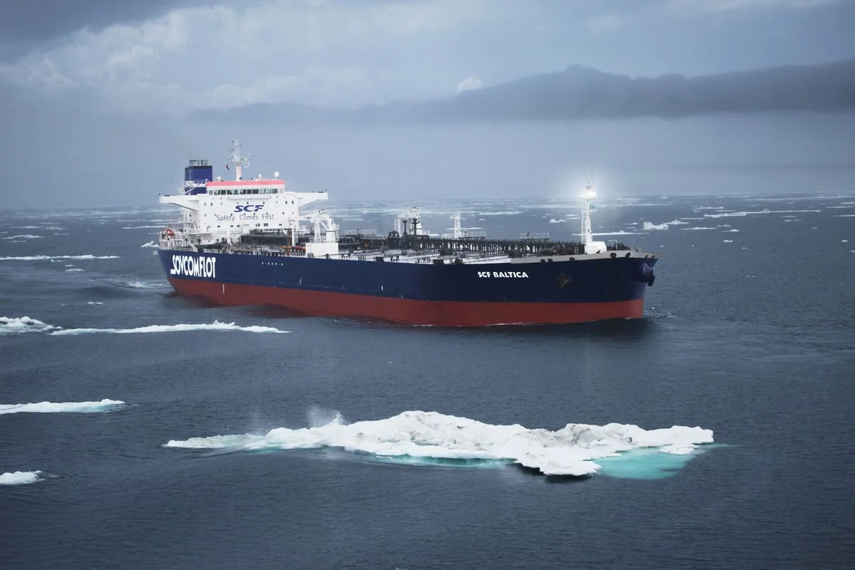 Russian sanctioned oil tanker navigating through icy waters, illustrating the complexities of maritime trade amid sanctions GEOTRENDS.EU