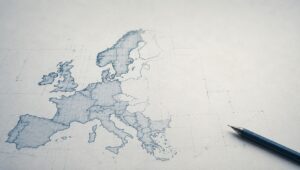 Minimalist horizontal illustration of a blueprint-style map of Europe on drafting paper, with a mechanical pencil resting beside an incomplete design