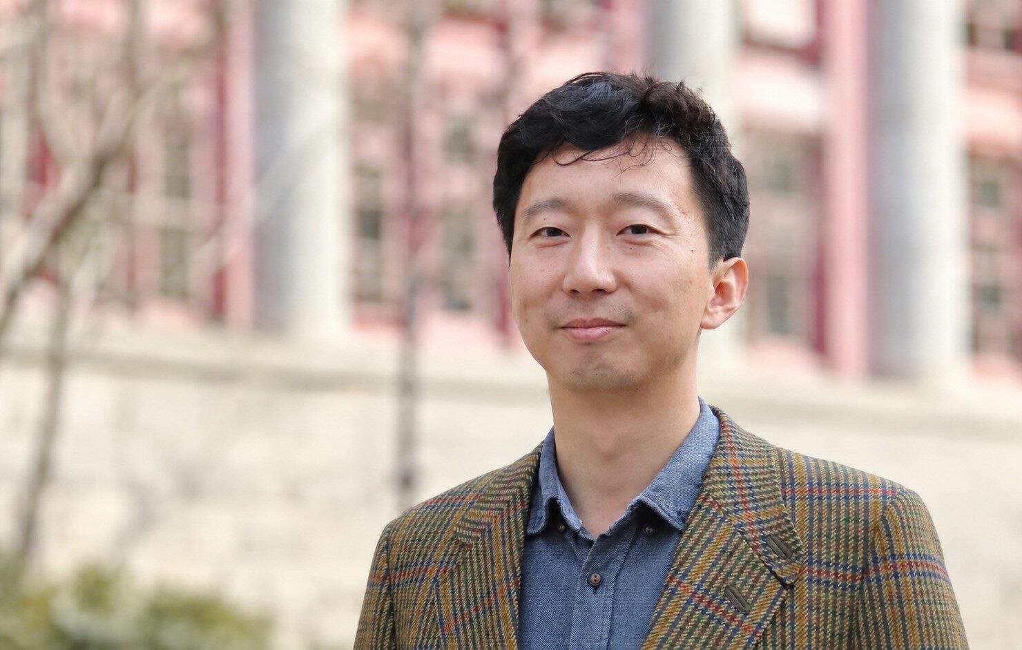 Xiaoyu Lu, professor at Peking University’s School of International Studies, pictured outdoors in an academic setting