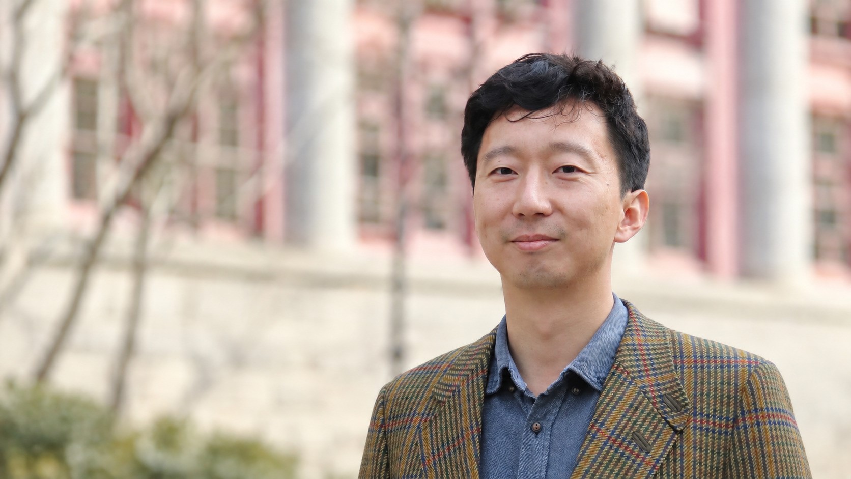 Xiaoyu Lu, professor at Peking University’s School of International Studies, pictured outdoors in an academic setting