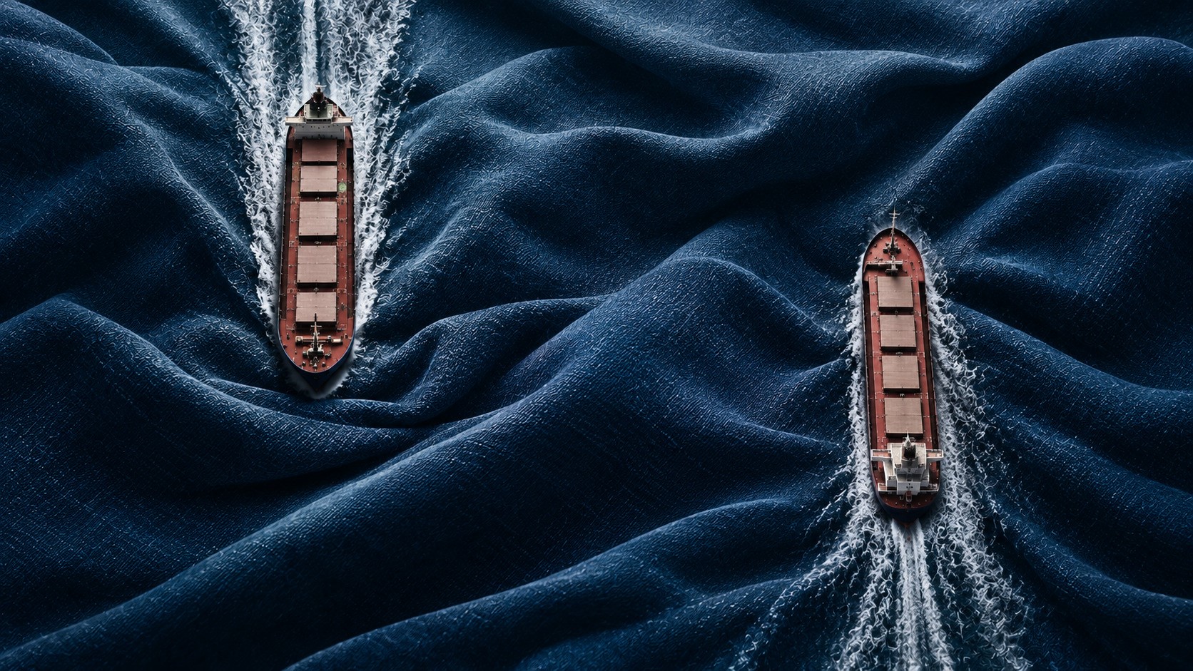 Aerial illustration of two bulk carriers navigating a dark blue ocean made of folded fabric, their white wakes cutting through textured waves, symbolising divergent fortunes in Ultramax and Handysize freight markets